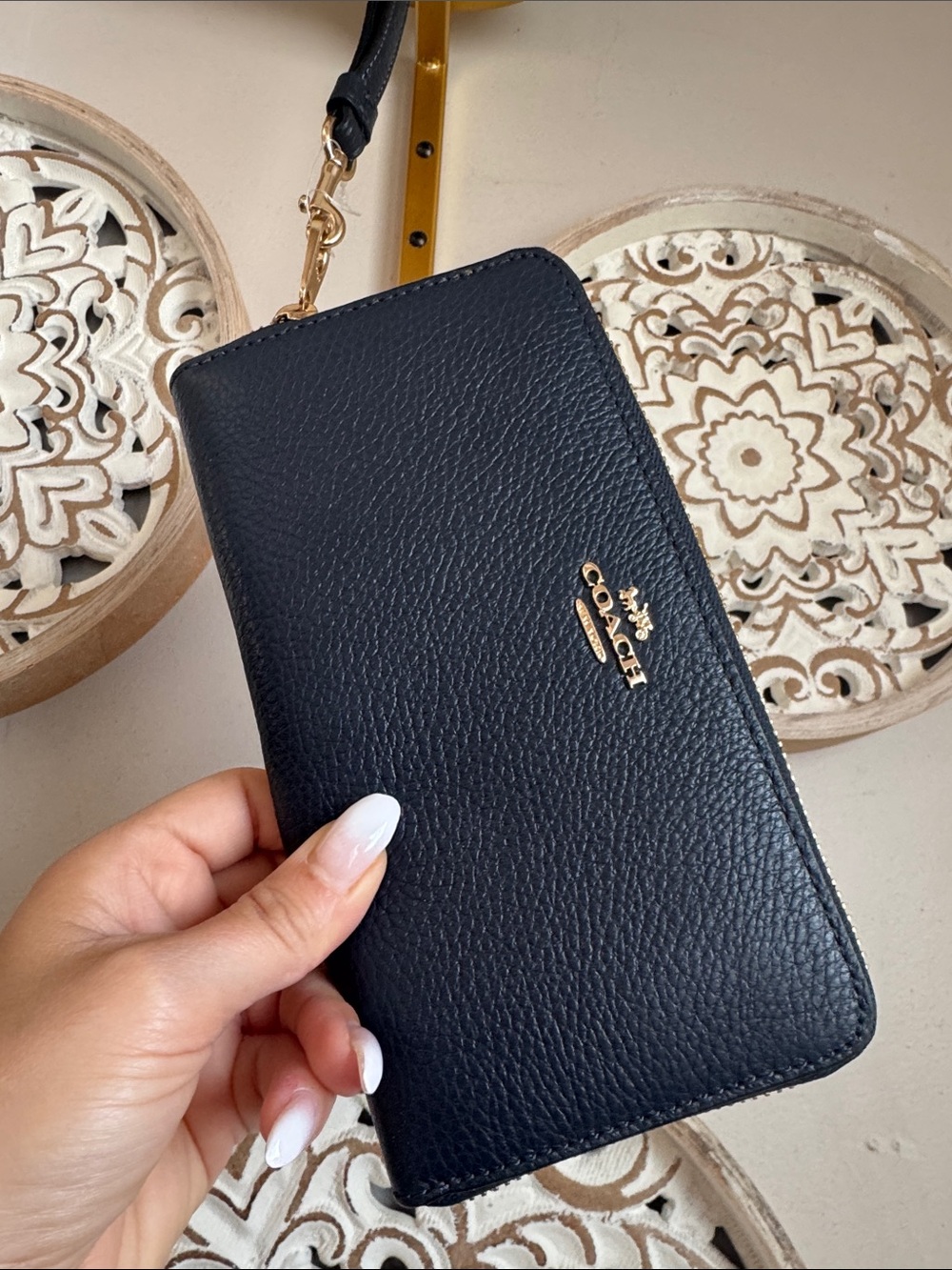 Coach navy Pebbled Leather Wristlet with Gold Logo